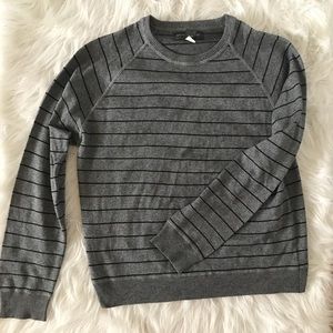 Black and grey sweater.